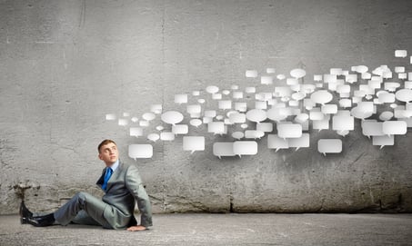 Image of young man sitting on floor. Communication concept